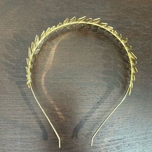 Gently used gold tone wreath head band